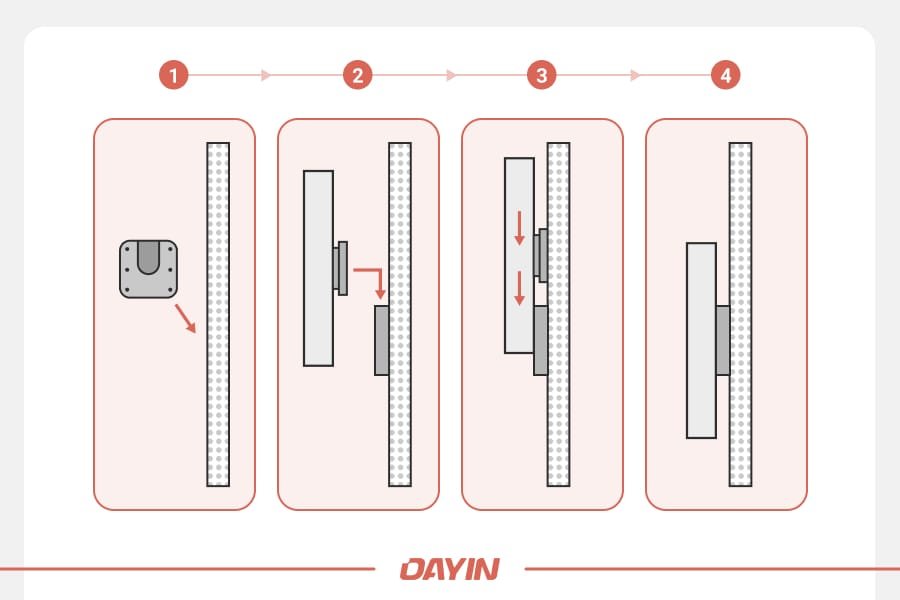 A demonstration of how the dart board disc should be slid down the bracket.