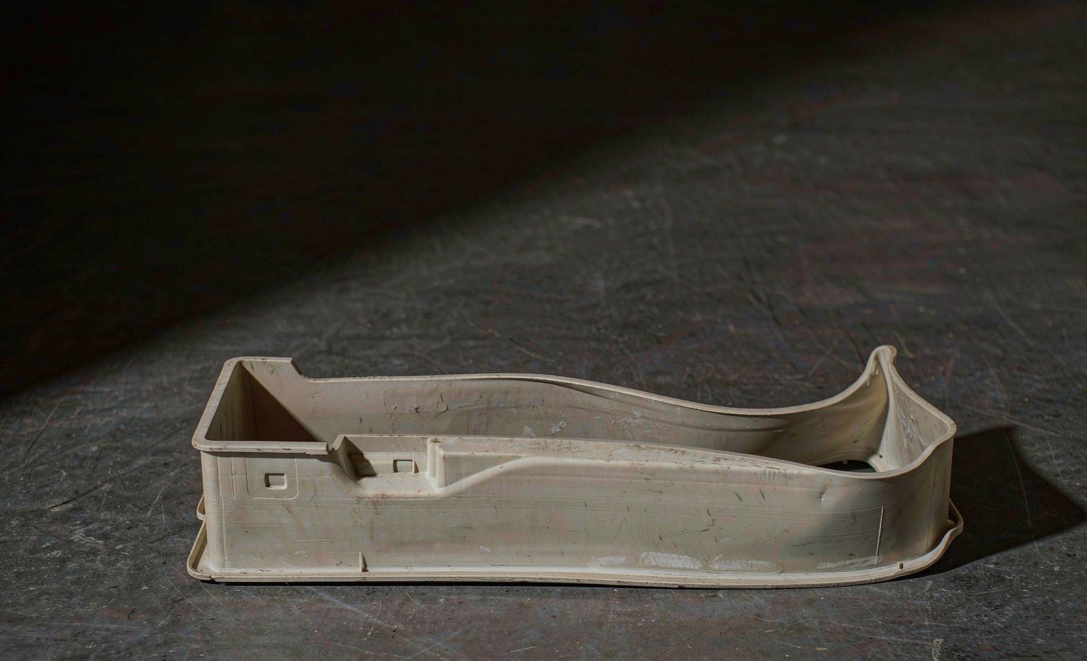 Warped injection molded part on a flat surface