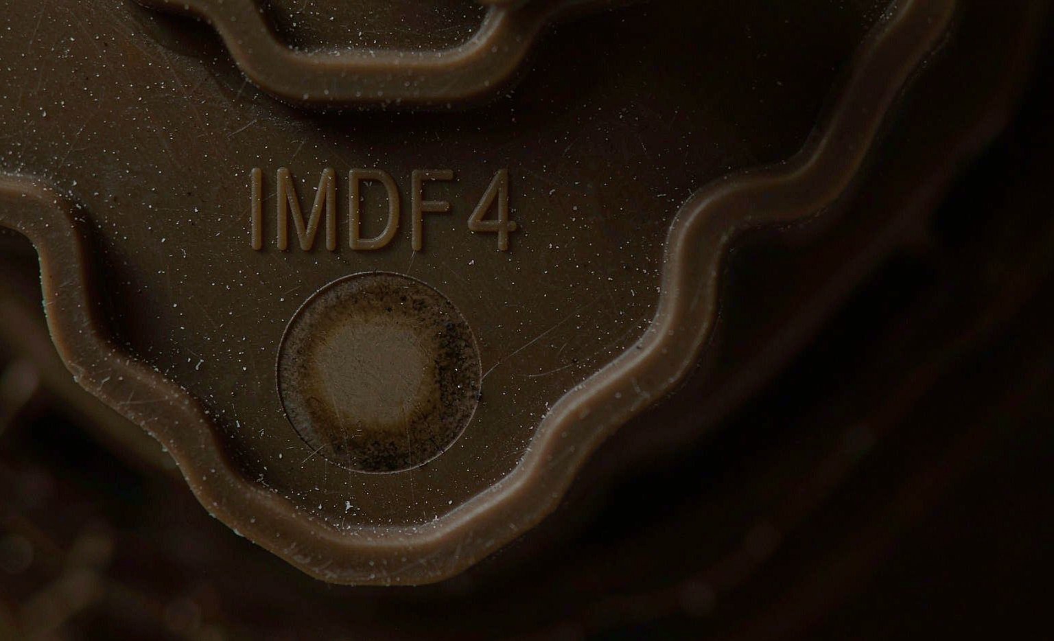 Burn mark discoloration on a molded plastic surface