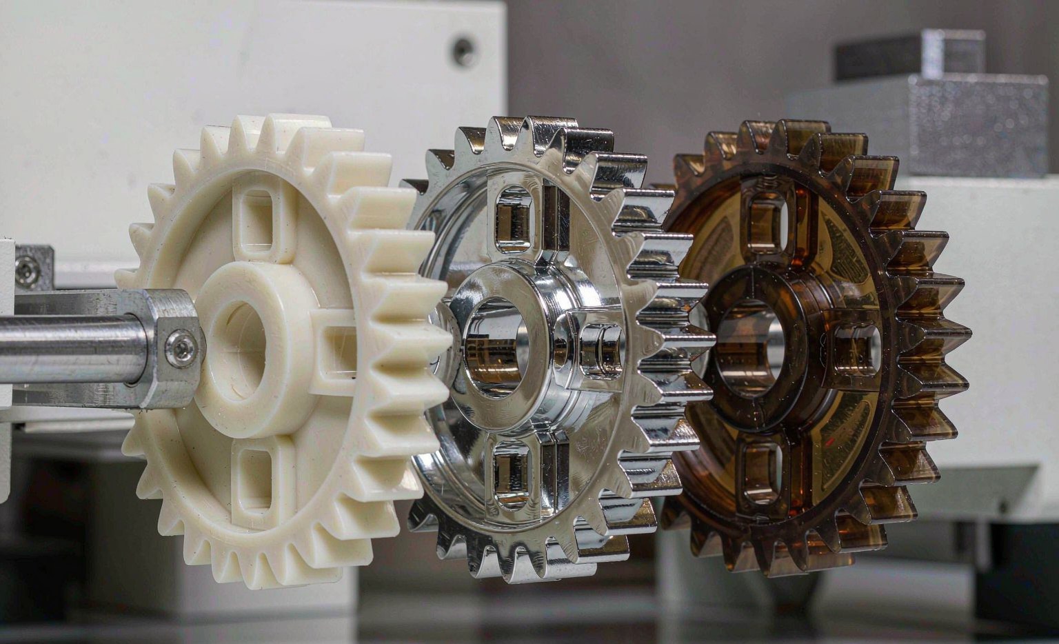 Comparison of three plastic gear samples in different resins