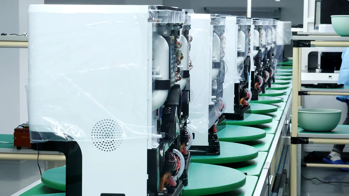 Injection-molded robot vacuum housings at DAYIN's custom robot vacuum cleaner factory