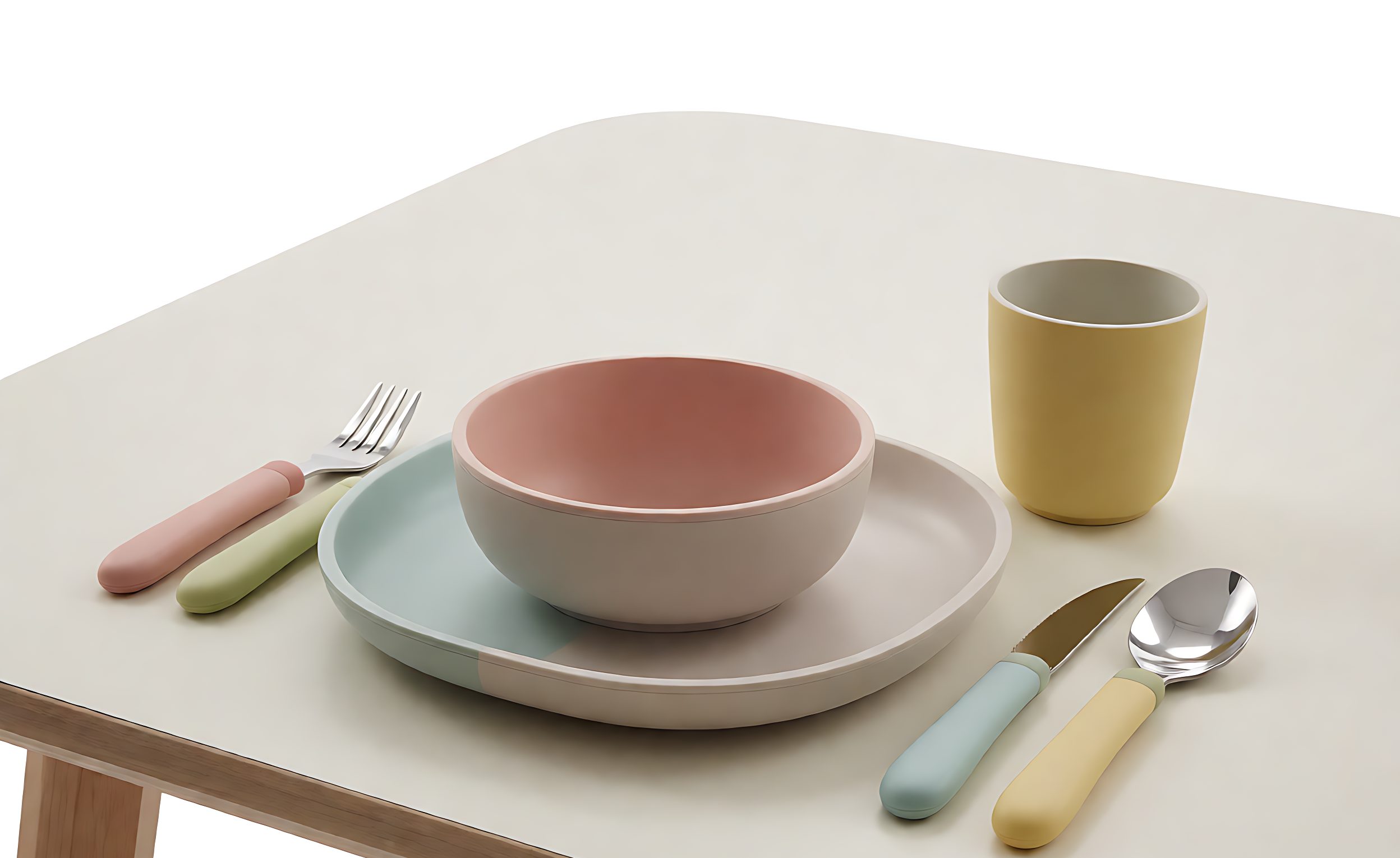 Children's dinnerware set with plate, bowl, cup and cutlery in soft colours