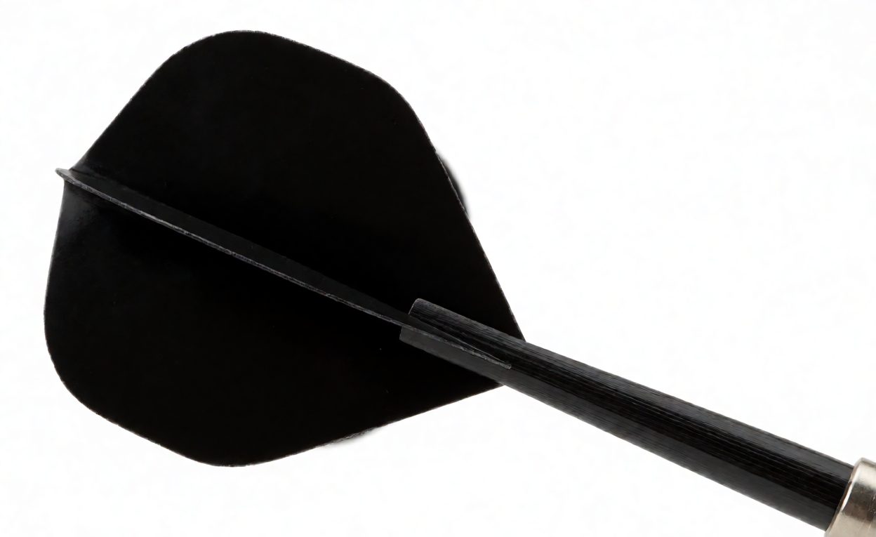 Macro shot of a moulded dart flight attached to a nylon shaft with a threaded joint